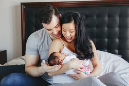Hong Kong Launches HK$20,000 Baby Bonus To Help Boost Birth Rates hong kong man and woman with baby