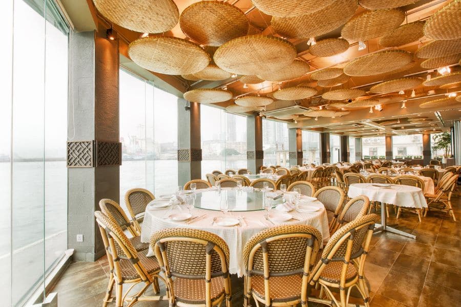 the interior of gateway cuisine seafood restaurant overlooks the water