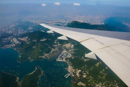 A Hong Kong Airline Has Been Named The World’s Fastest Growing Carrier of 2024 airplane over hong kong