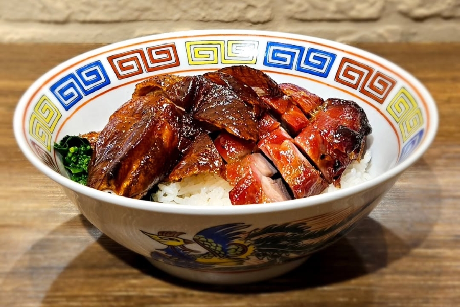 a bowl of char siu roasted goose rice at new restaurant fat j char siu in wan chai