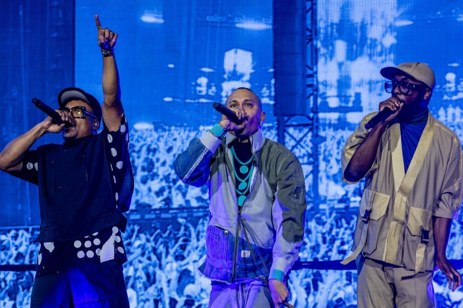 three members of american hip hop group black eyed peas