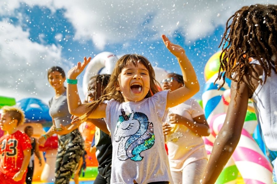 kids playing at the bounce house