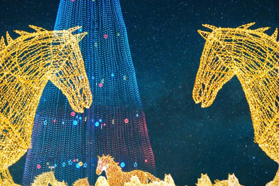 Light sculptures at Festilumi, including large-scale illuminated figures and the Tree of Lights.