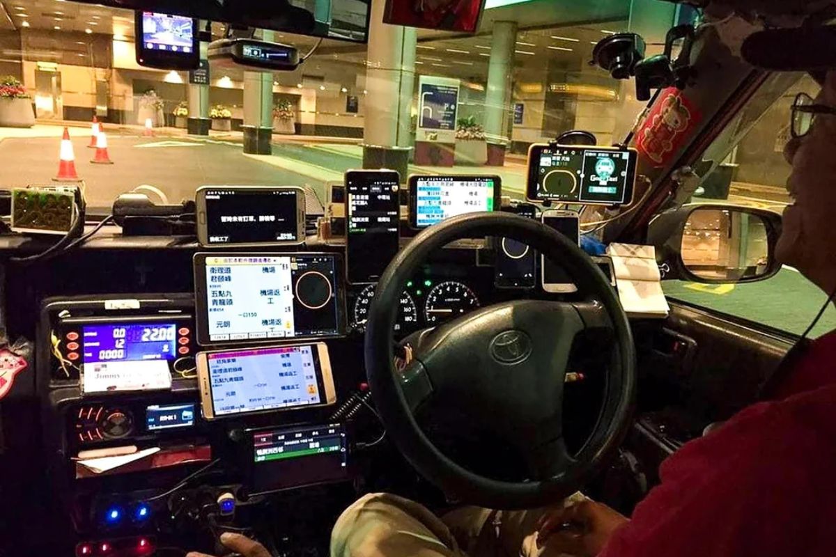 taxi driver with over 10 screens in hong kong