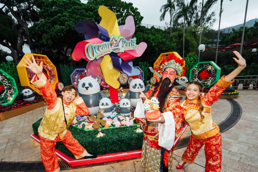 God of Fortune with performers at Ocean Park panda display (Ocean Park)