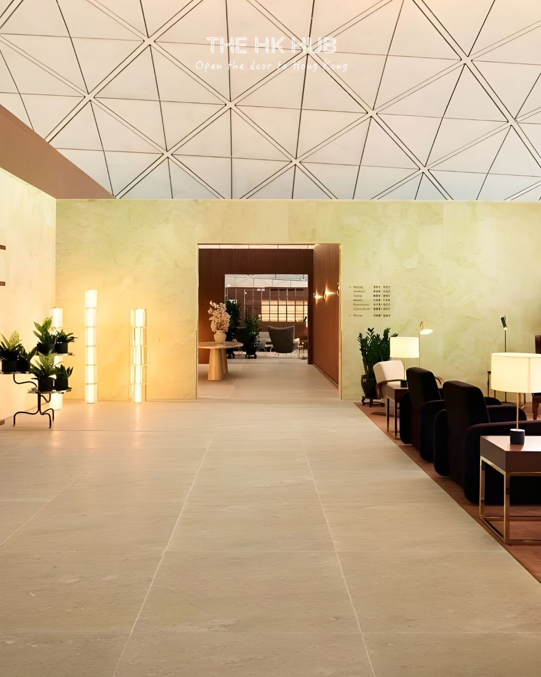 Warm entrance with onyx details, wood accents, and signature scent (Cathay Pacific)