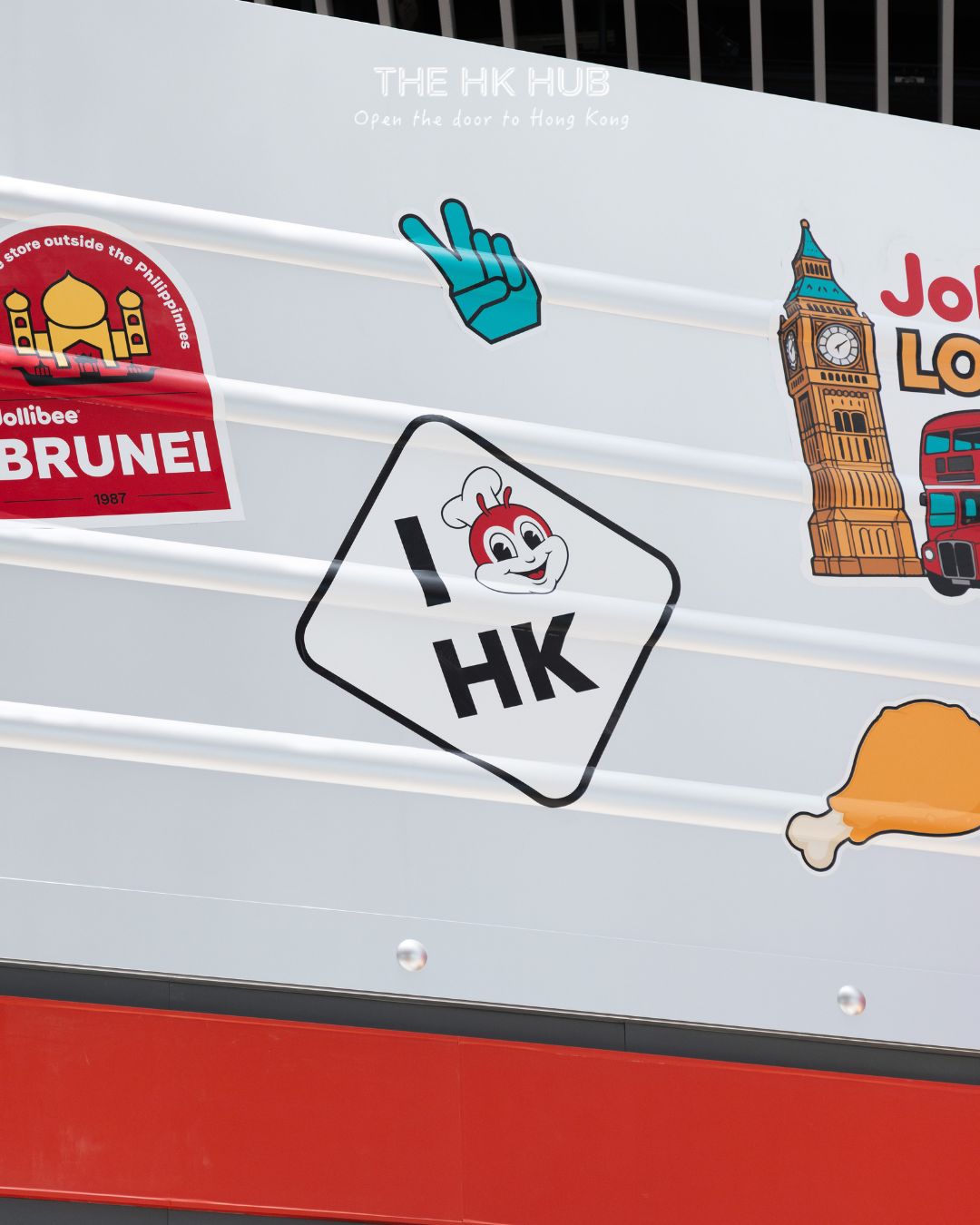 Travel stickers and Hong Kong details on Jollibee’s suitcase-themed airport store design (Sinclair)