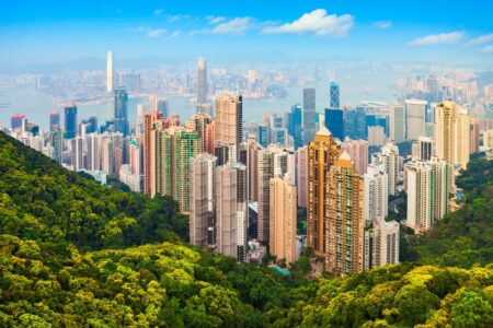 Hong Kong Named World’s 4th Richest Market By Average Adult Wealth hong kong skyline on a sunny day