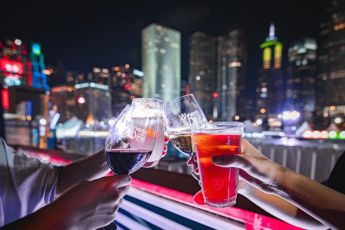 Hong Kong Wine & Dine Festival Expands to Tamar Park With Over 340 Booths From October 29 hong kong wine and dine festival glasses cheering
